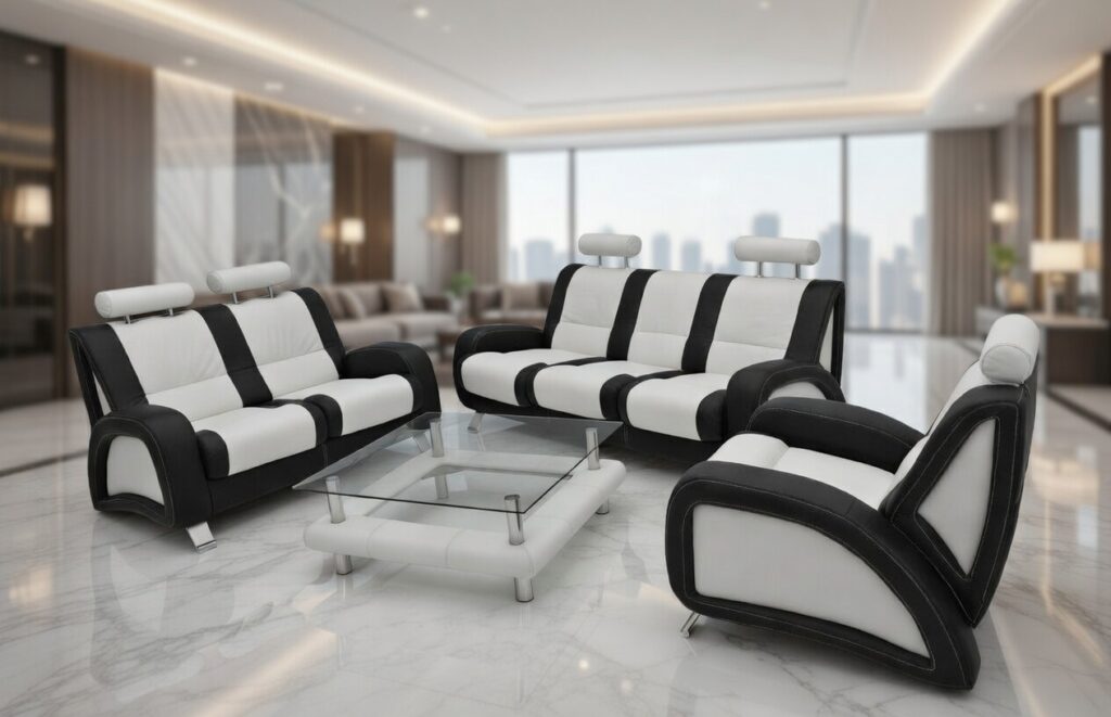 Czarno‑białe skórzane sofy o nowoczesnym designie w luksusowym salonie z marmurową podłogą i dużymi oknami.